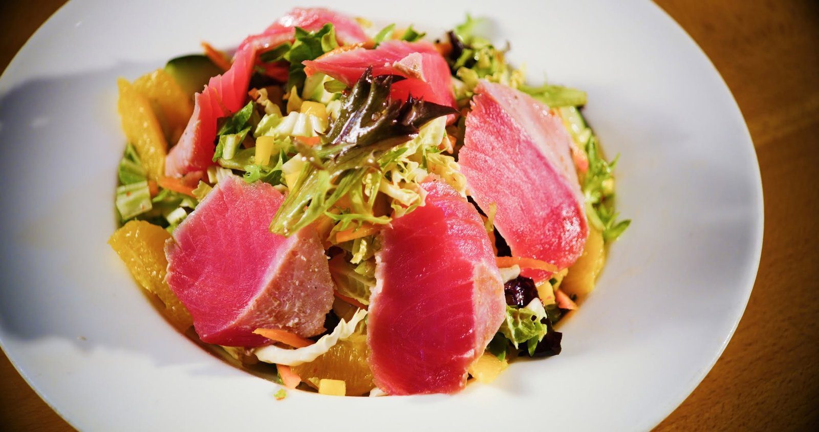 Seared rare ahi tuna salad with tropical fruit