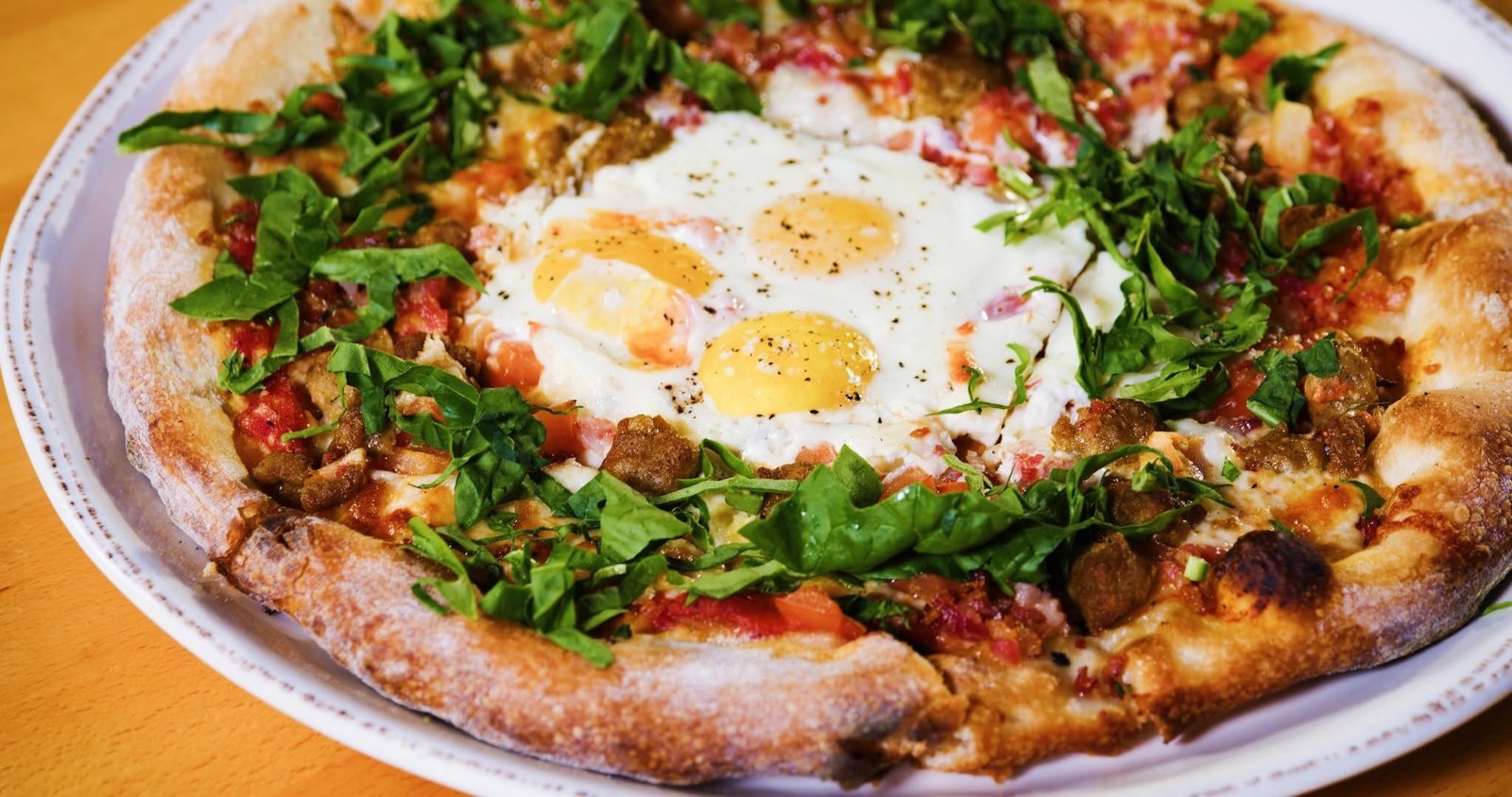 Breakfast pizza with eggs